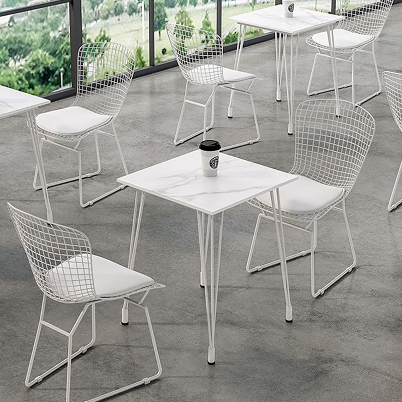 Mesa de comedor al aire libre con trípode Mesa de cena moderna con base metálica y tapa de piedra