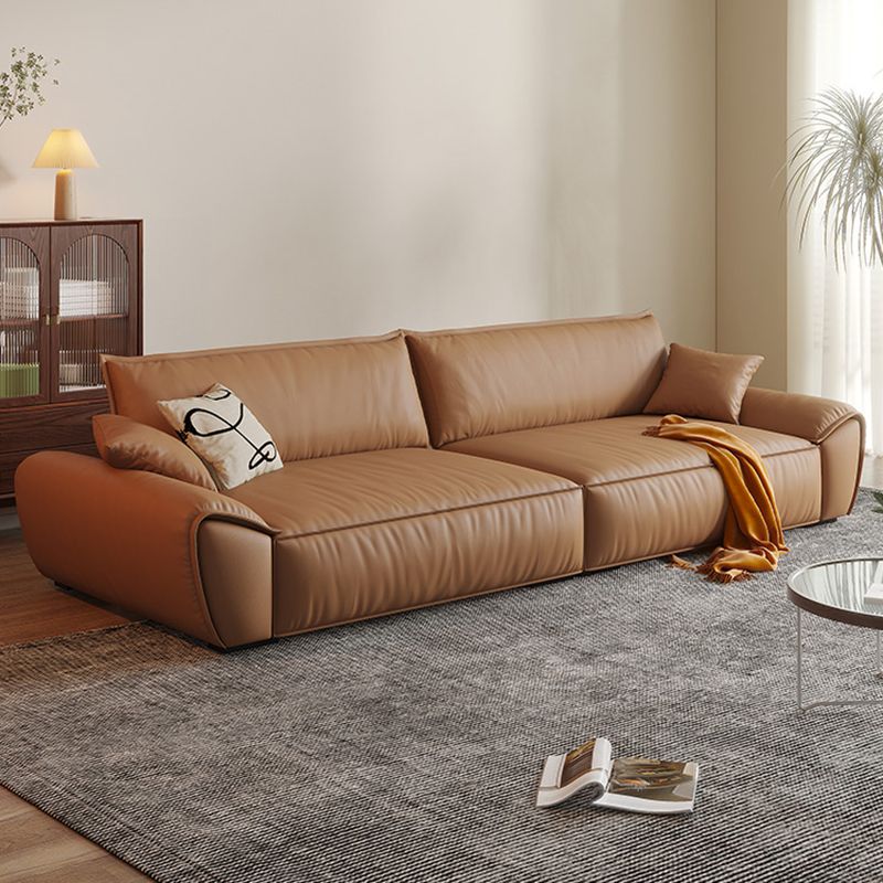 Canapé à bras évasé marron en faux cuir et sièges en cuir authentique avec oreillers