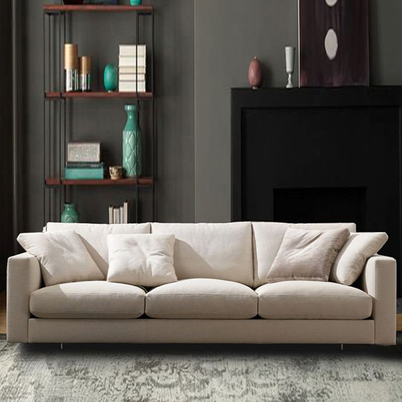 Canapé de bras carré standard avec oreillers siège en beige pour l'appartement