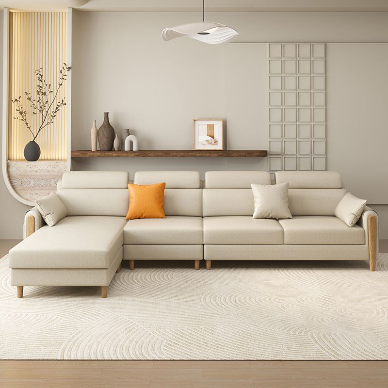 Sezione beige in pelle di divano sezionale scandinava con cuscini