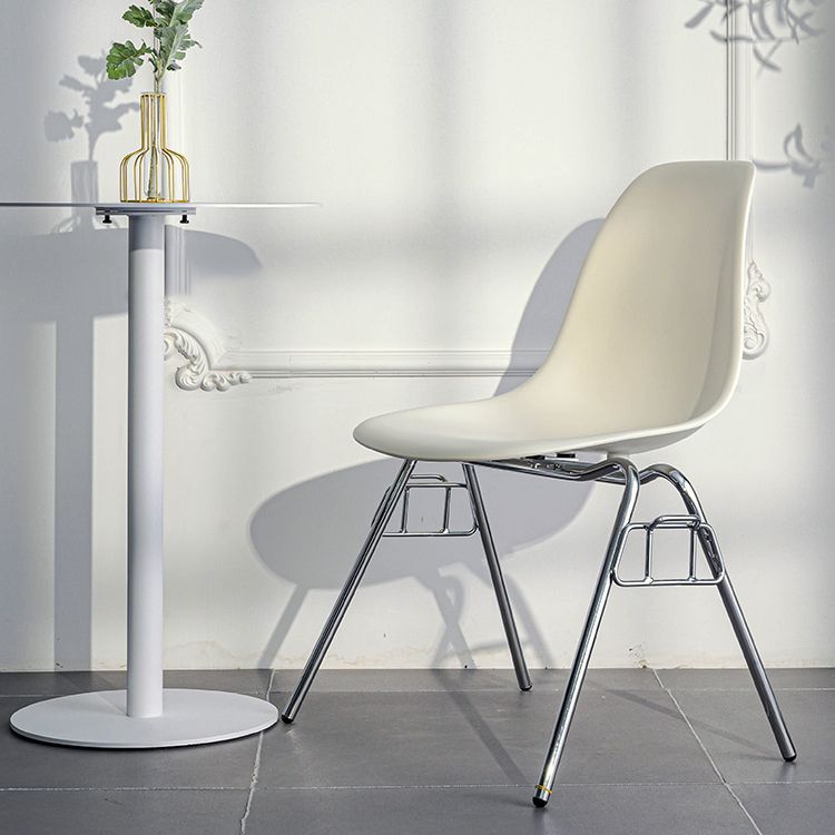Minimalist Style Solid Back Plastic Chair for Home Use Stackable Armless Side Chair Clearhalo ' kitchen&dining_furn' 'Dining Chairs' 'Dining Tables & Seating' 'dining_chair' 'Furniture' 'furniture_dining_chair' 'Kitchen & Dining Furniture' 'kitchen' 1200x1200_a4b8f47d-d61c-40f6-b491-f08fddfa4c6a