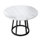 Mesa de comedor de base de hierro negro redondo Mesa de pedestal de piedra moderna