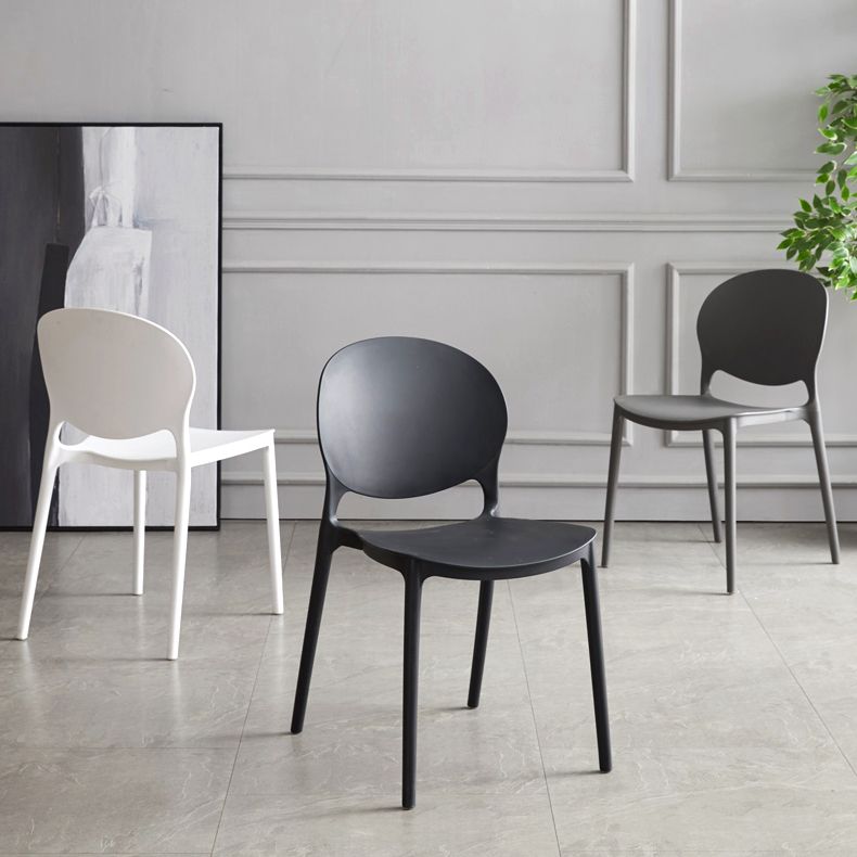 Scandinavian Armless Dining Chairs Plastic Indoor Stackable Open Back Side Chair Clearhalo ' kitchen&dining_furn' 'Dining Chairs' 'Dining Tables & Seating' 'dining_chair' 'furn' 'furn_dining_chair' 'Furniture' 'furniture_dining_chair' 'Kitchen & Dining Furniture' 'kitchen' 1200x1200_a53e7e8f-10a0-4d95-95f5-332dc865feb0