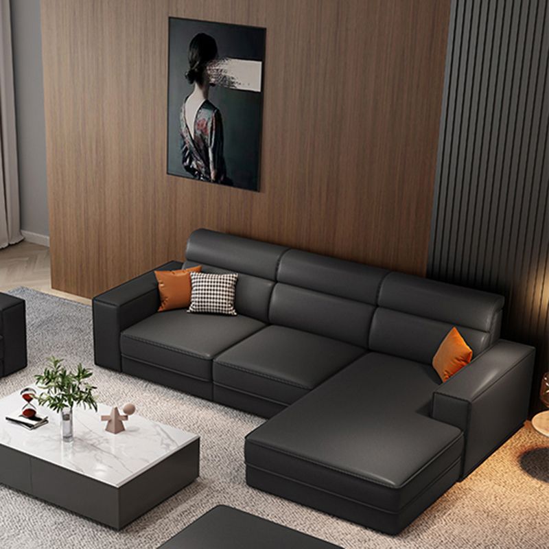 Divano in finta pelle scandinavo grigio scuro del braccio quadrato.