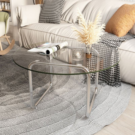 Mesa de café con tapa de vidrio redondo contemporáneo con patas de trineo de acero