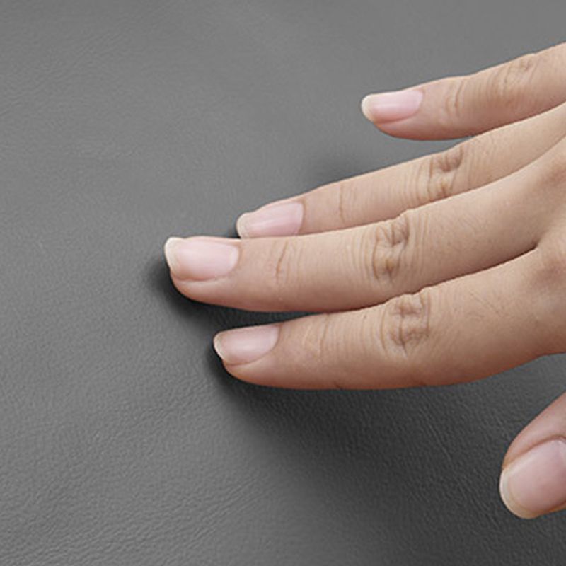 Piattaforma grigio scuro letto in legno e piattaforma imbottita con gambe metalliche