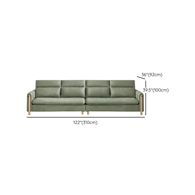 Opslag eigentijdse bank met vierkante arm en genaaid kussen terug