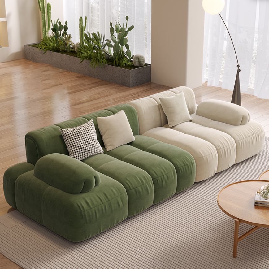 Sedute scandinaviane in finta pelle verde trapuntata braccio salotto