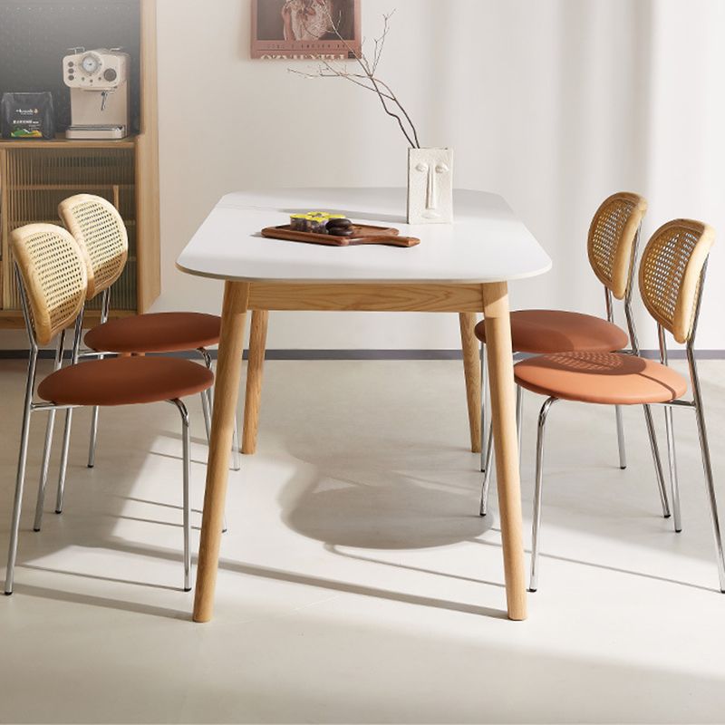 Table rectangulaire de style moderne en pierre frittée avec pieds en bois pour la maison