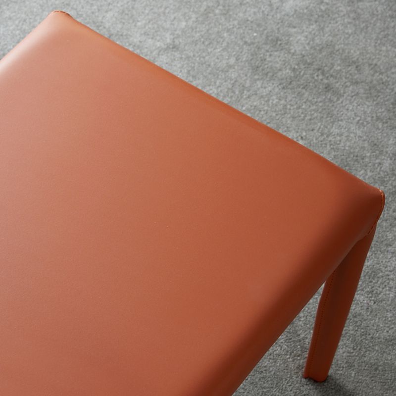 Eigentijdse lederen armloze eetkamerstoel Metalen eetkamerstoelen voor thuisgebruik