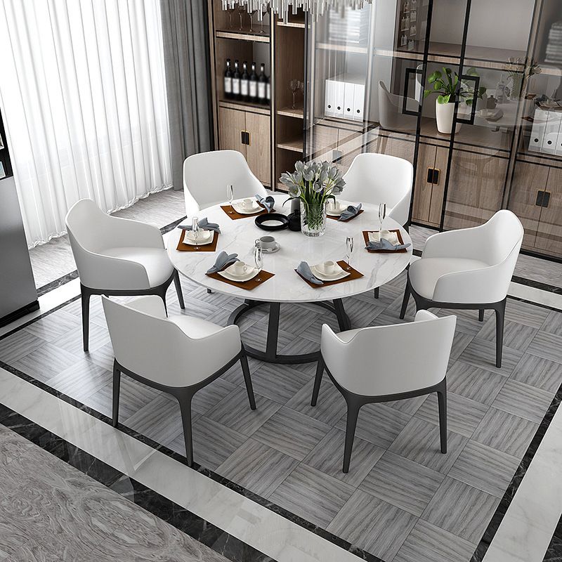 Mesa de comedor redonda contemporánea Mesa de pedestal de hierro con tapa de piedra sinterizada
