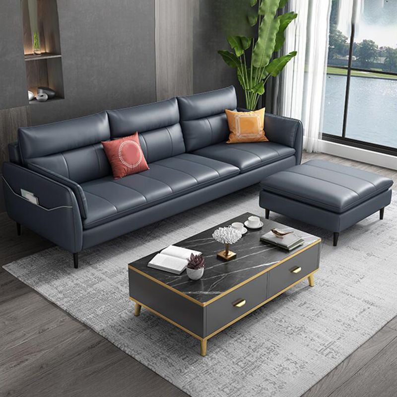 Divano blu glam di glam resistente alla macchia sedute al braccio cuscino posteriore