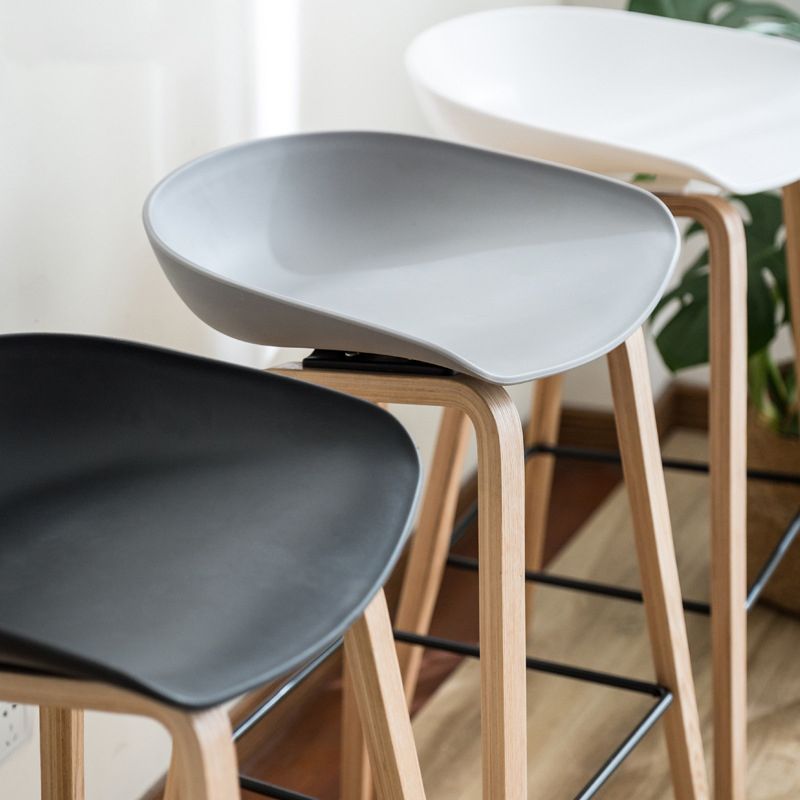 Modern Plastic Counter Stool Footrest Low Back Bucket Coffee Shop Bar Stool with Wood Legs Clearhalo 'Bar Furniture' 'Bar Stools' 'bar_stools' 'furn' 'furn_bar_stools' 'furniture_bar_stools' 'Kitchen & Dining Furniture' 'kitchen&dining_furn' 'kitchen' 'kitchen_furn' Furniture' 1200x1200_abd7c246-0b11-44cc-8822-b930060903fd