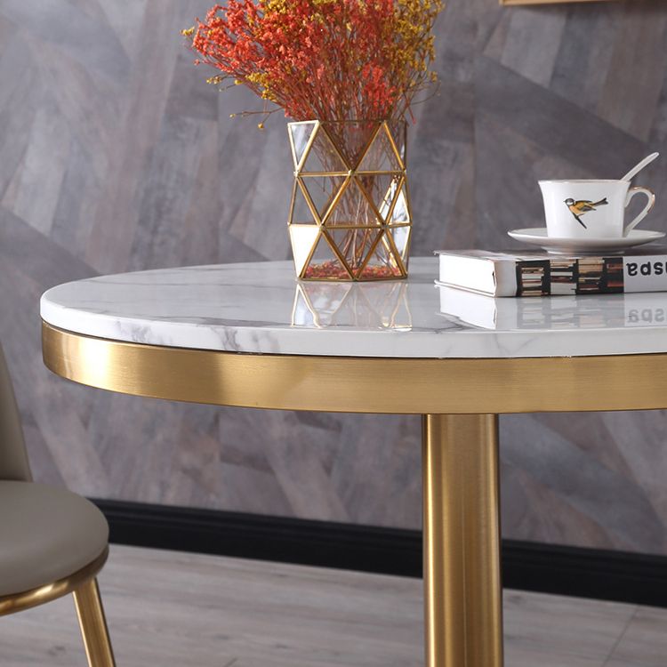 Tavolo da top in pietra in metallo tradizionale tavolo da pranzo rotondo di lusso con base di piedistallo