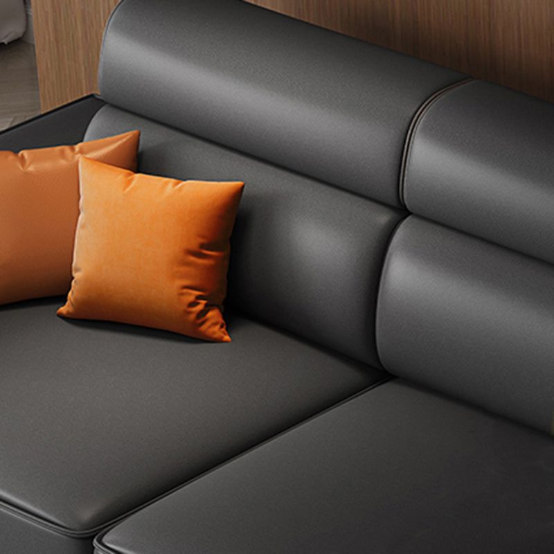 Divano in finta pelle scandinavo grigio scuro del braccio quadrato.