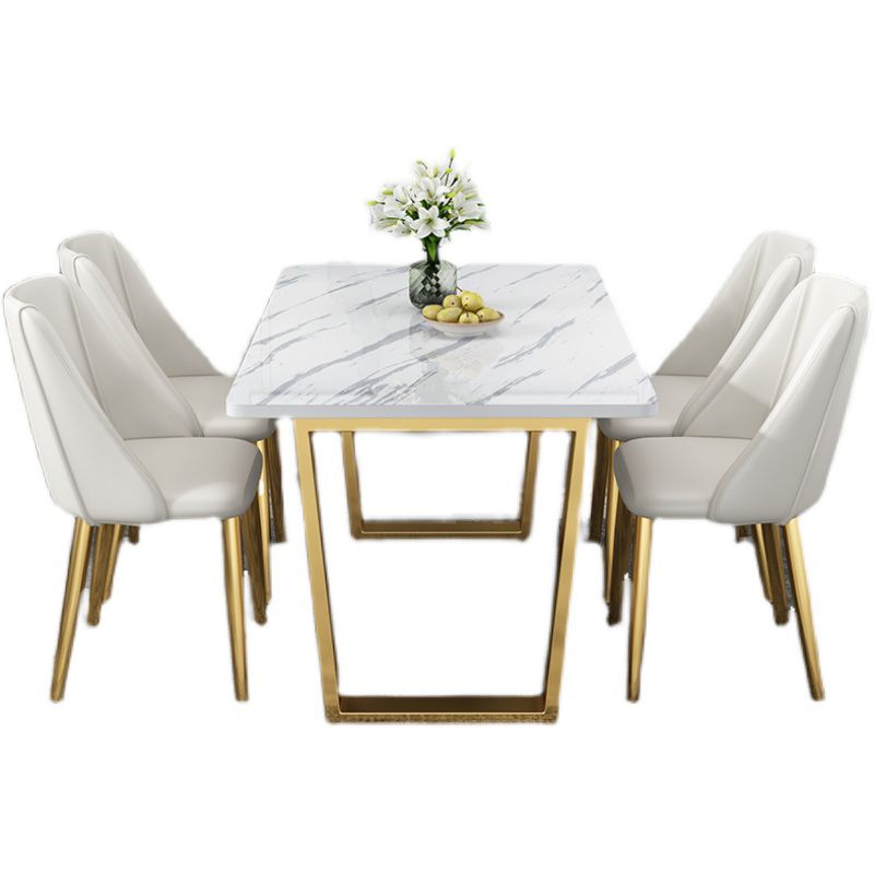 Table rectangulaire de luxe traditionnelle en métal, table en pierre frittée blanche avec base luge