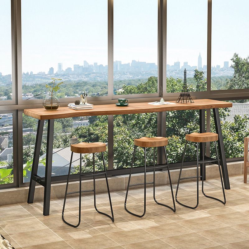 Living Room Modern Patio Bar Table Solid Wood Natural Footrest Bistro Bar Desk Clearhalo 'Bar Furniture' 'Bar Tables' 'bar_tables' 'furn' 'furn_bar_tables' 'Furniture' 'furniture_bar_tables' 'Kitchen & Dining Furniture' 1200x1200_b0097439-665f-4aa7-8e43-32ffa430dcc4