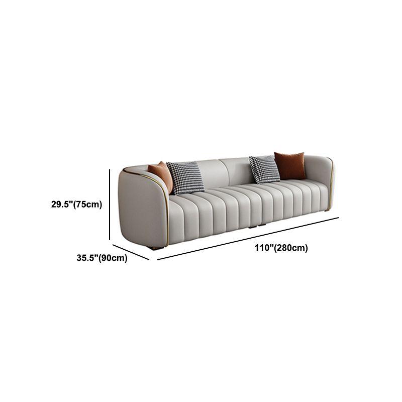 Echte lederen hellende armbank Moderne beige bank met kussens