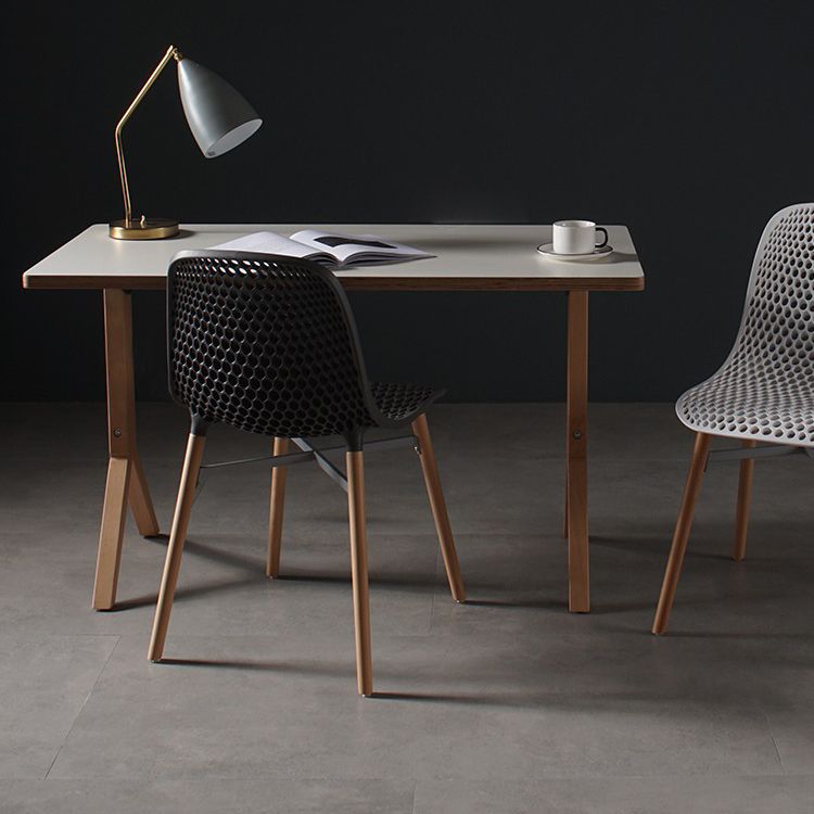 Scandinavian Style Plastic Dining Armless Chair Solid Back Chair with Wooden Legs Clearhalo ' kitchen&dining_furn' 'Dining Chairs' 'Dining Tables & Seating' 'dining_chair' 'furn' 'furn_dining_chair' 'Furniture' 'furniture_dining_chair' 'Kitchen & Dining Furniture' 'kitchen' 1200x1200_b11eb474-1080-4037-8938-93c9f148d2f9