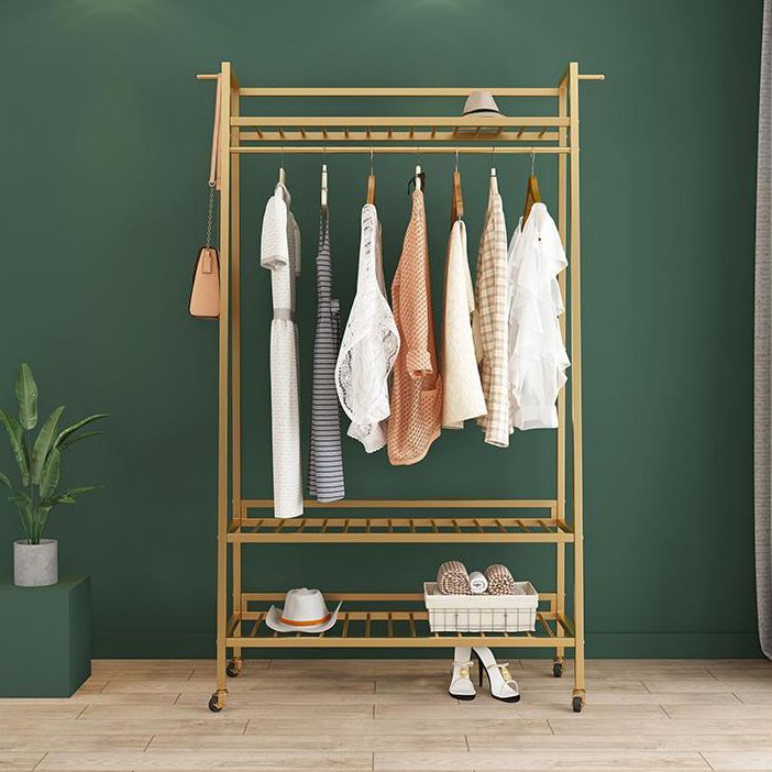 Zeitgenössischer Stil Open Armoire Gold Metal -Rettungsfleisch mit Kleidungsstange