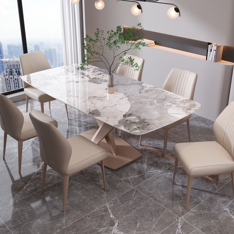 椅子付きの現代的な長方形の焼結された石のトップメタルベースダイニングテーブル