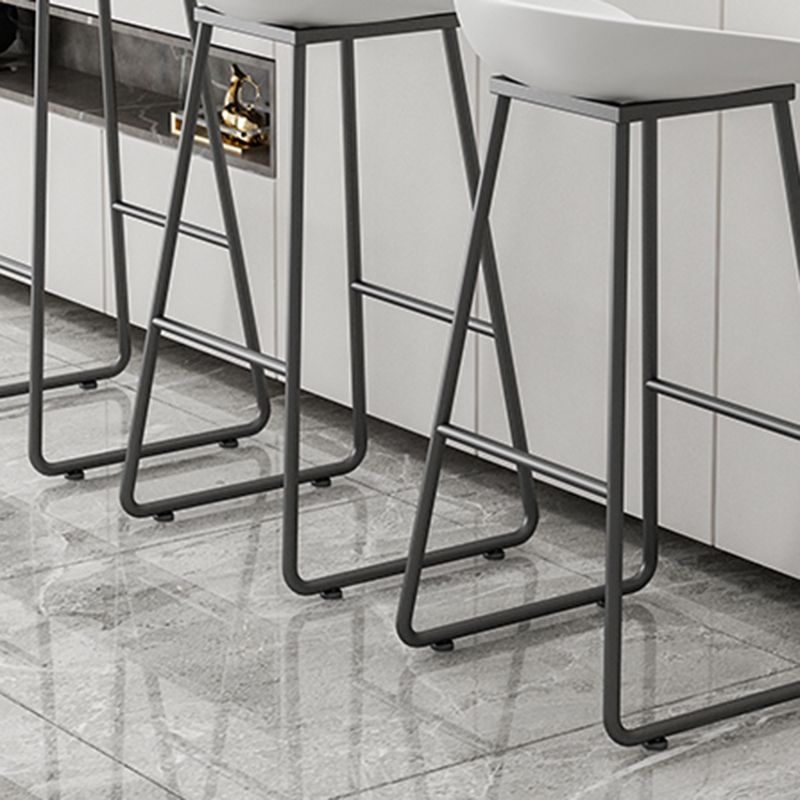 Contemporary Bucket Counter Bar Stool Armless Plastic Bar Stool with Footrest, Iron Base Clearhalo 'Bar Furniture' 'Bar Stools' 'bar_stools' 'furn' 'furn_bar_stools' 'furniture_bar_stools' 'Kitchen & Dining Furniture' 'kitchen&dining_furn' 'kitchen' 'kitchen_furn' Furniture' 1200x1200_b40bee72-d2e3-4cca-a221-e13dc806cc4e