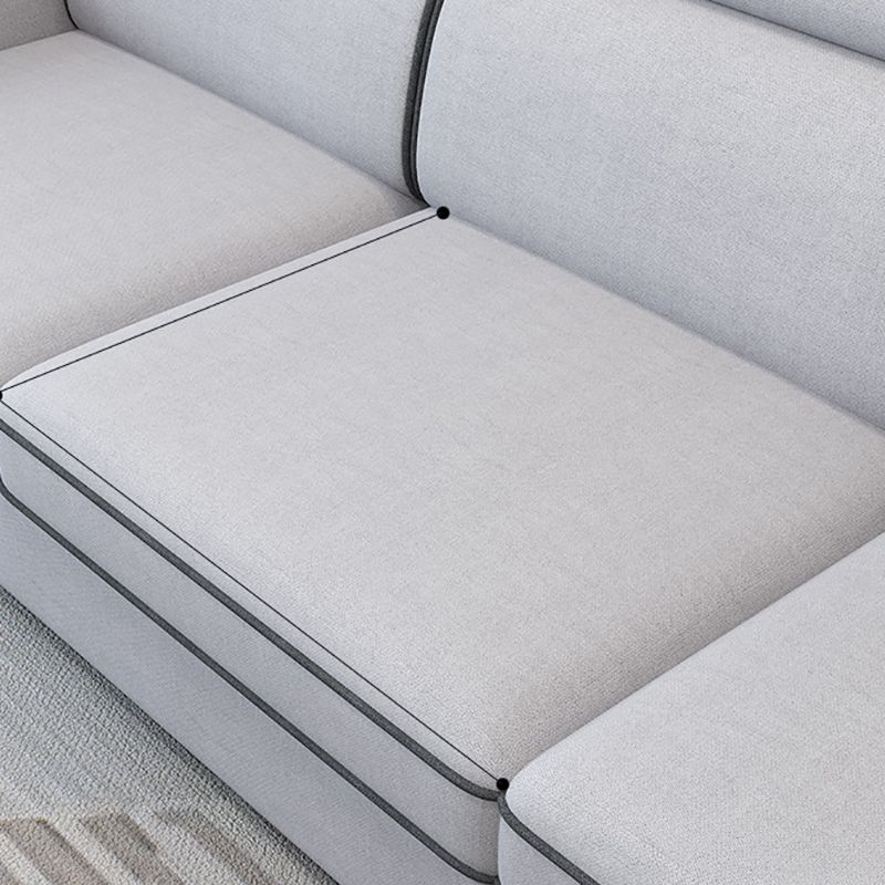 現代的なリビングルームの静止したくぼんだ腕のクッションシート