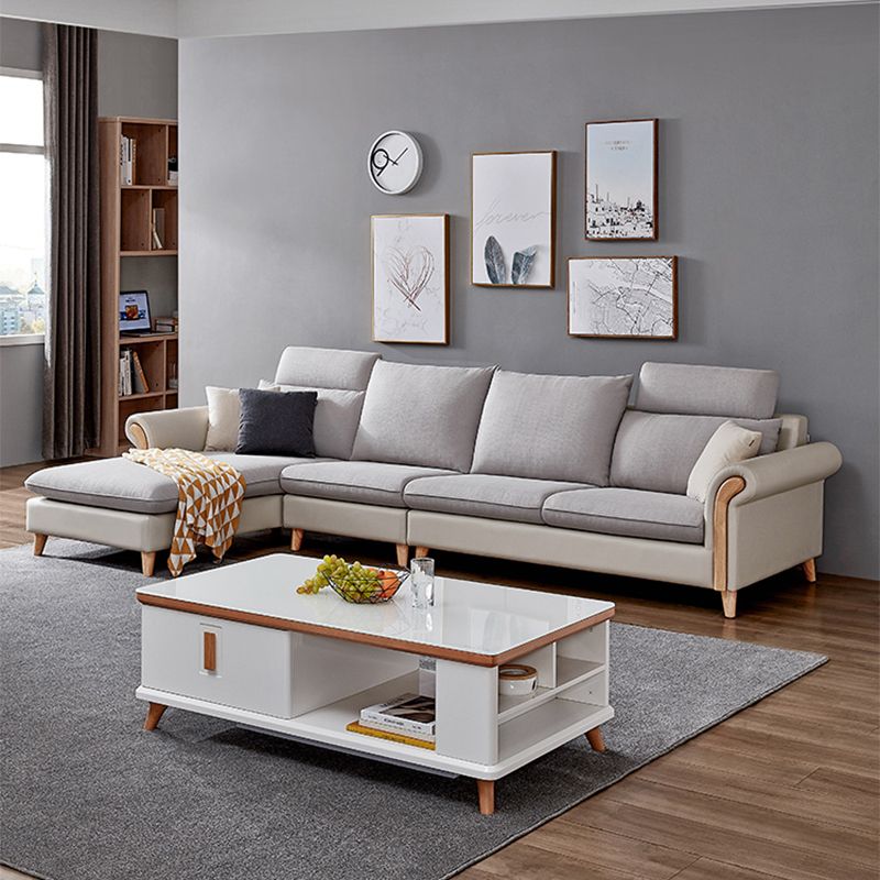 Sezionali di tessuto posteriore a cuscinetto svasato con un divano scandinavo con chaise