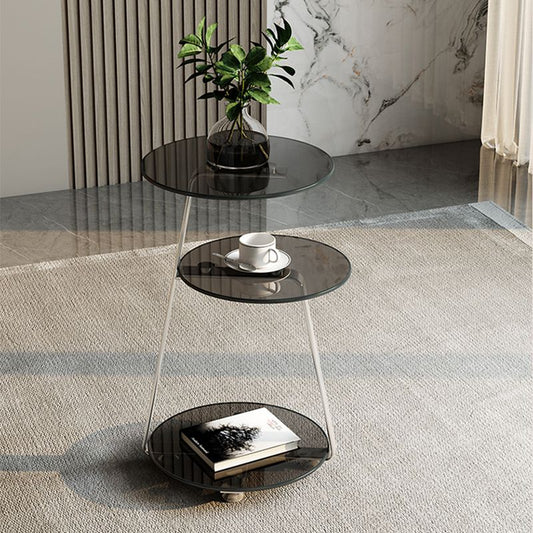 Tavolino laterale moderno di vetro rotondo moderno di vetro rotondo moderni.