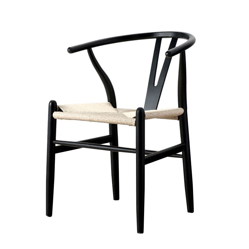 Silla de respaldo moderna de reposabrazos con patas de madera para el comedor