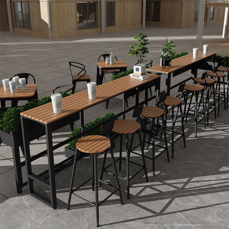 Modern Style Bar Table Solid Wood and Black Iron Base Coffee Shop Bar Table Clearhalo 'Bar Furniture' 'Bar Tables' 'bar_tables' 'furn' 'furn_bar_tables' 'Furniture' 'furniture_bar_tables' 'Kitchen & Dining Furniture' 'kitchen&dining_furn' 'kitchen' 1200x1200_b7386f2f-fb24-43e4-92fe-1c7bb185a5f3