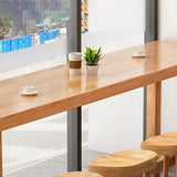 Modern Beige Rectangle Bar Dining Table Pine Wood Indoor Bistro Table with Footrest Clearhalo 'Bar Furniture' 'Bar Tables' 'bar_tables' 'furn' 'furn_bar_tables' 'Furniture' 'furniture_bar_tables' 'Kitchen & Dining Furniture' 1200x1200_b7ee89bf-5c3a-46ea-a062-e2e27fd61666
