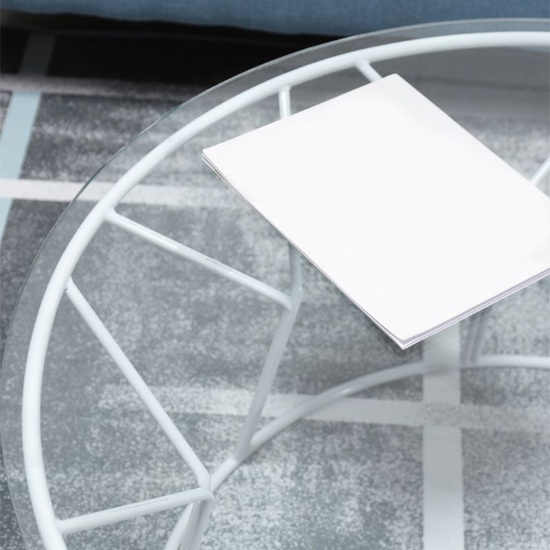 Tavolino contemporaneo con top in vetro rotondo e base di ferro