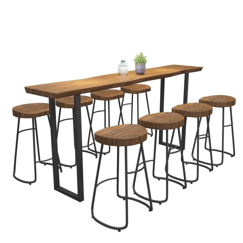 Mesa de bar de madera maciza especializada Mesa de bar de pub industrial marrón con base de trineo