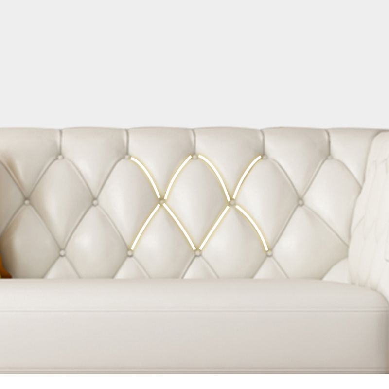 Divano posteriore trapuntato contemporaneo con braccio svasato in pelle finta per l'appartamento