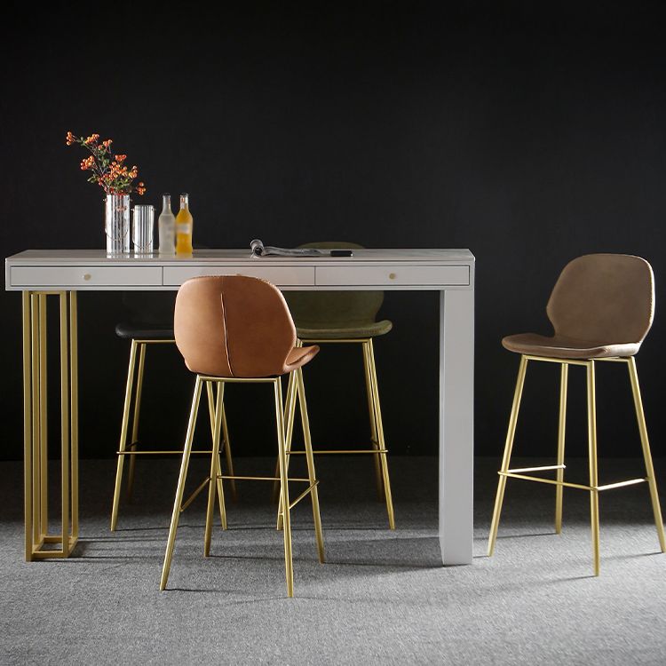 Tavolo da pranzo accento in pietra e metallo