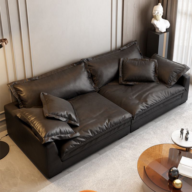 Soggiorno in vetro in pelle stazionaria in vetrino. Divano nero