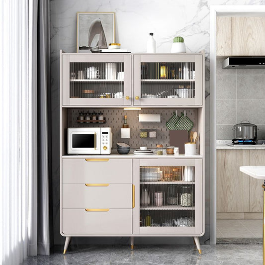 Tampone da pranzo in pietra in stile glam con armadi e cassetti