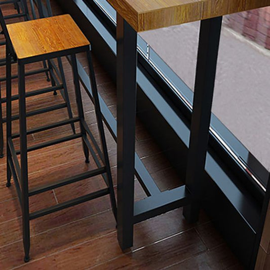 Brown Modern Style Bar Table Solid Wood and Metal with Footrest Coffee Shop Table Clearhalo 'Bar Furniture' 'Bar Tables' 'bar_tables' 'furn' 'furn_bar_tables' 'Furniture' 'furniture_bar_tables' 'Kitchen & Dining Furniture' 1200x1200_be6f8bda-5d1b-49f7-8e18-459fb5f21b72