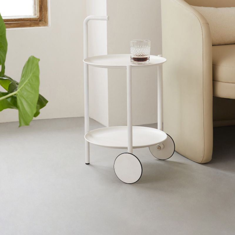 Table d'appoint supérieur du plateau rond du milieu du siècle du milieu du siècle avec roue et étagère