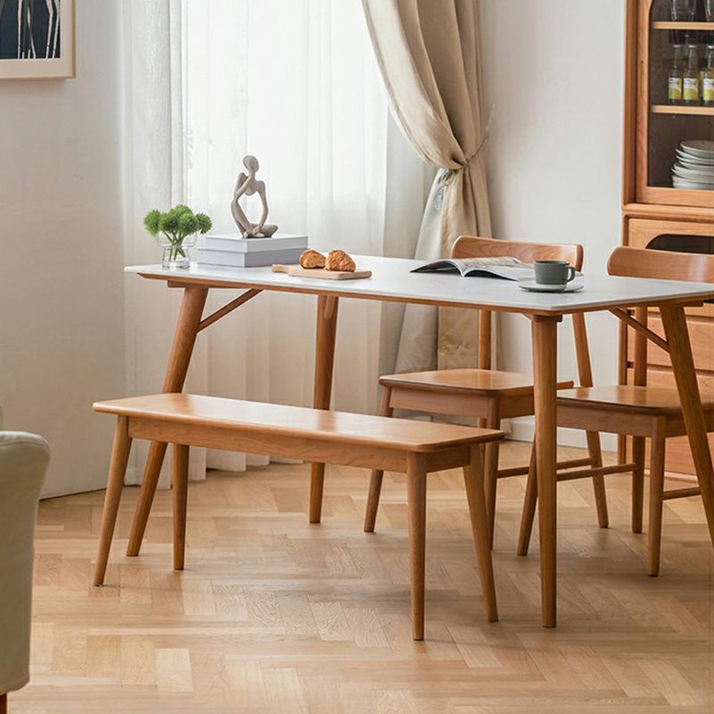 Table à manger rectangulaire blanche contemporaine avec des pattes en bois massif