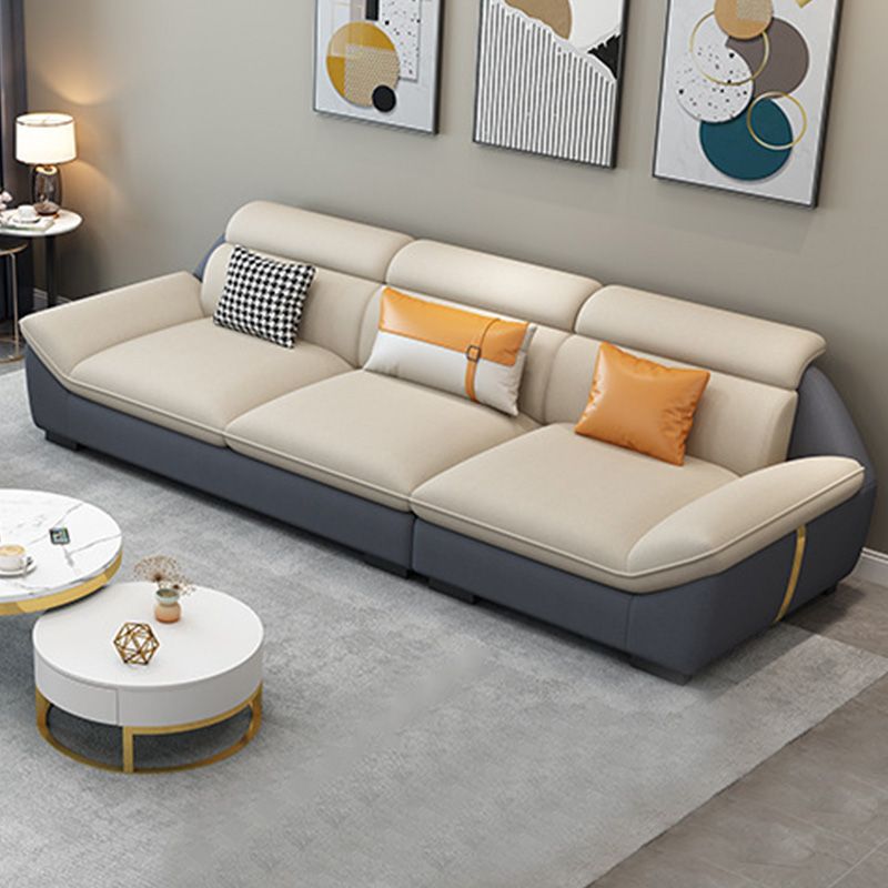 Nordic Faux Leather Sectional in Beige Flared Arm Sectional with Pillows