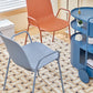 Silla de brazo de estilo contemporáneo silla de comedor de plástico con base de metal