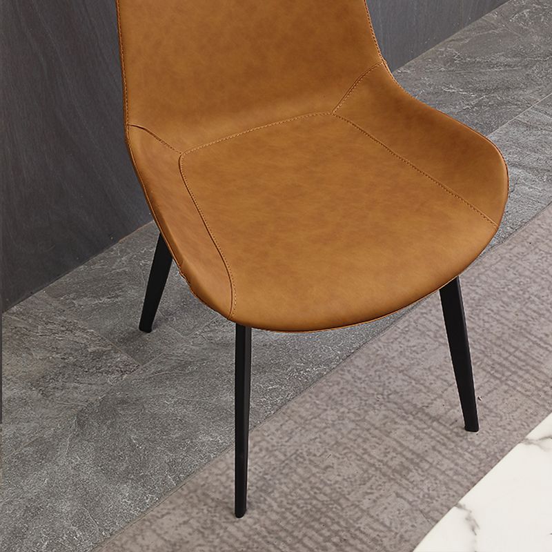 Gestoffeerde armloze eetkamerstoelen faux leer en metalen eetstoelen