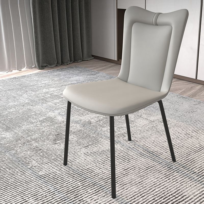 Black Iron Legs Dining Chairs Modern Faux Leather Armless Side Chair Clearhalo 'Dining Chairs' 'Dining Tables & Seating' 'dining_chair' 'furn' 'furn_dining_chair' 'Furniture' 'Kitchen & Dining Furniture' 1200x1200_c12f2801-c914-42b4-9b6f-d2a50d35f7b6
