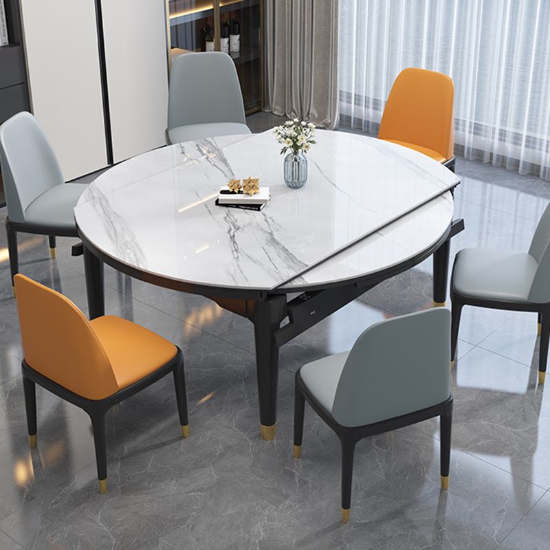 Luxe ronde grijze stenen topverlenging eettafel met 4 zwarte en gouden poten