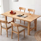 Mesa de comedor rectangular de madera maciza de color natural con base de caballete