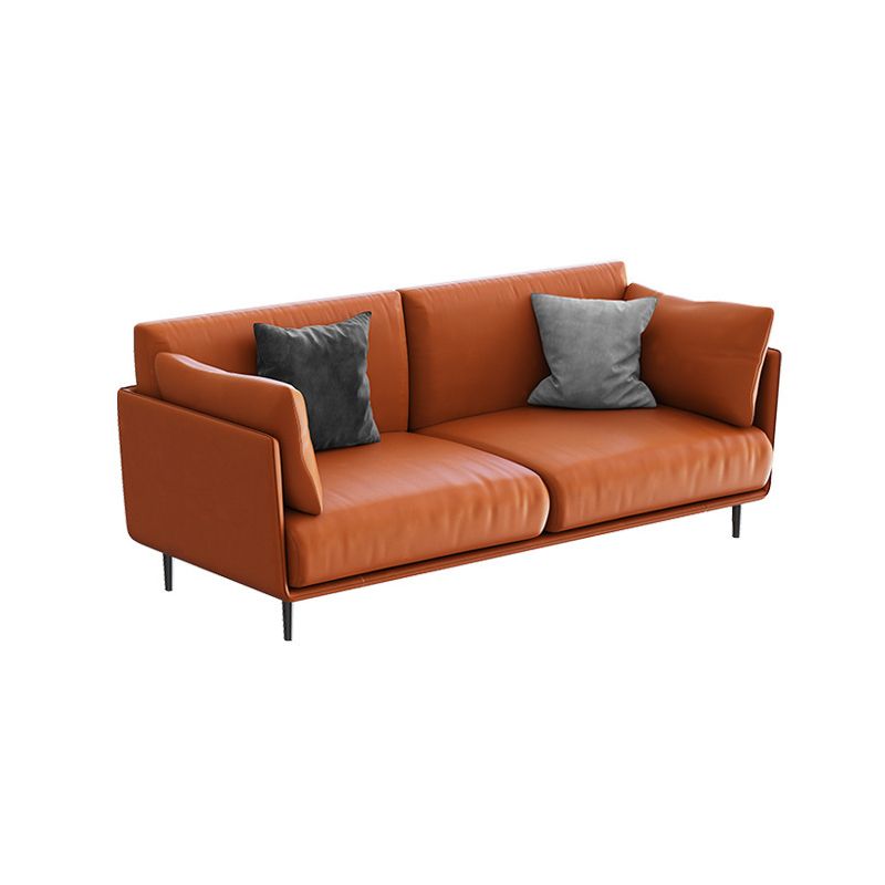Divano con divano arancione in finta pelle cuscino con gambe metalliche