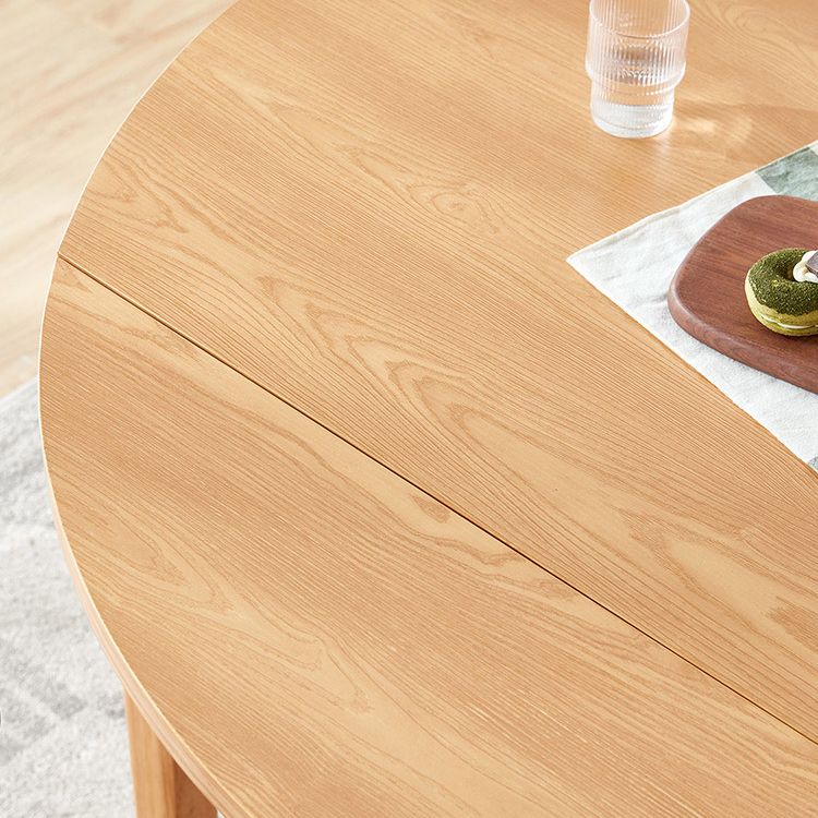 Eigentijdse uitbreidbare ronde eettafel met houten druppelblad