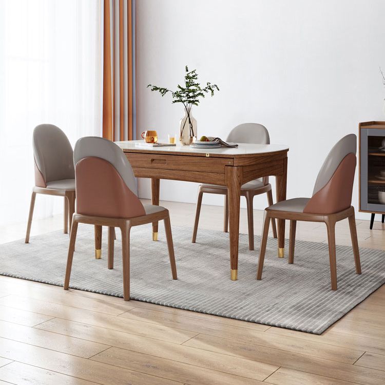 Tavolo da pranzo moderno scalabile in pietra con gambe in legno massello per sala da pranzo